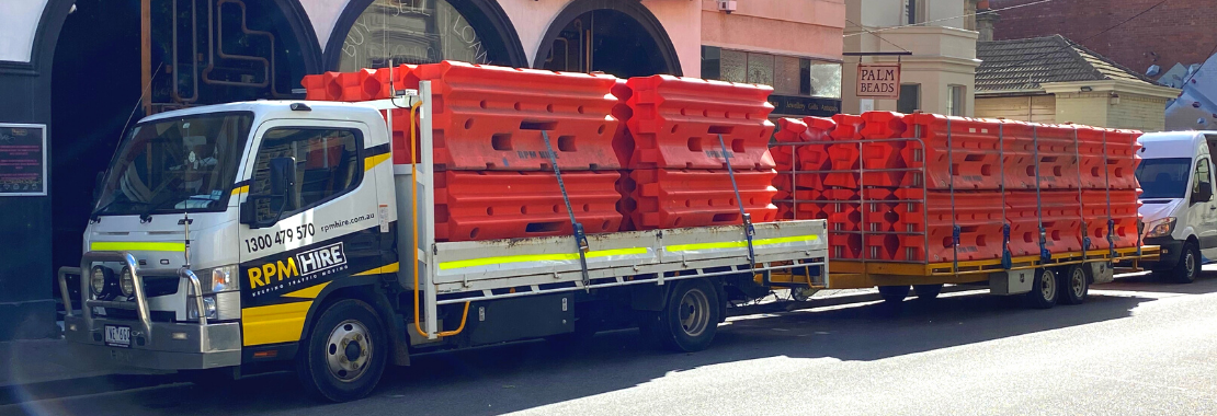 RPM Hire truck with Water Filled Barriers